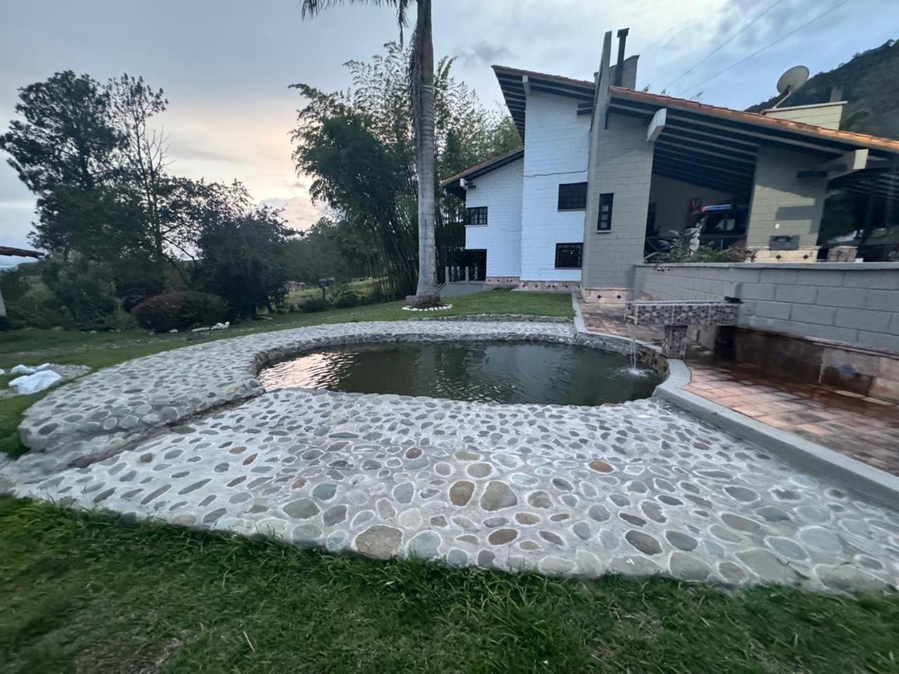 Hotel Maca Lago Calima Exteriör bild